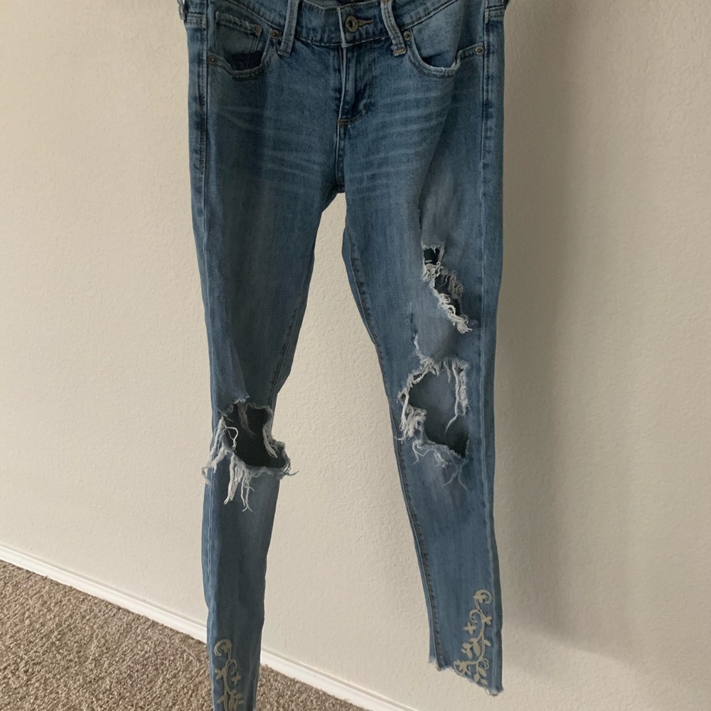 Lucky brand distressed Charlie Skinny Jeans 25